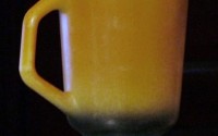 Fire King Orange and Black Matte Finish Footed Coffee Mug